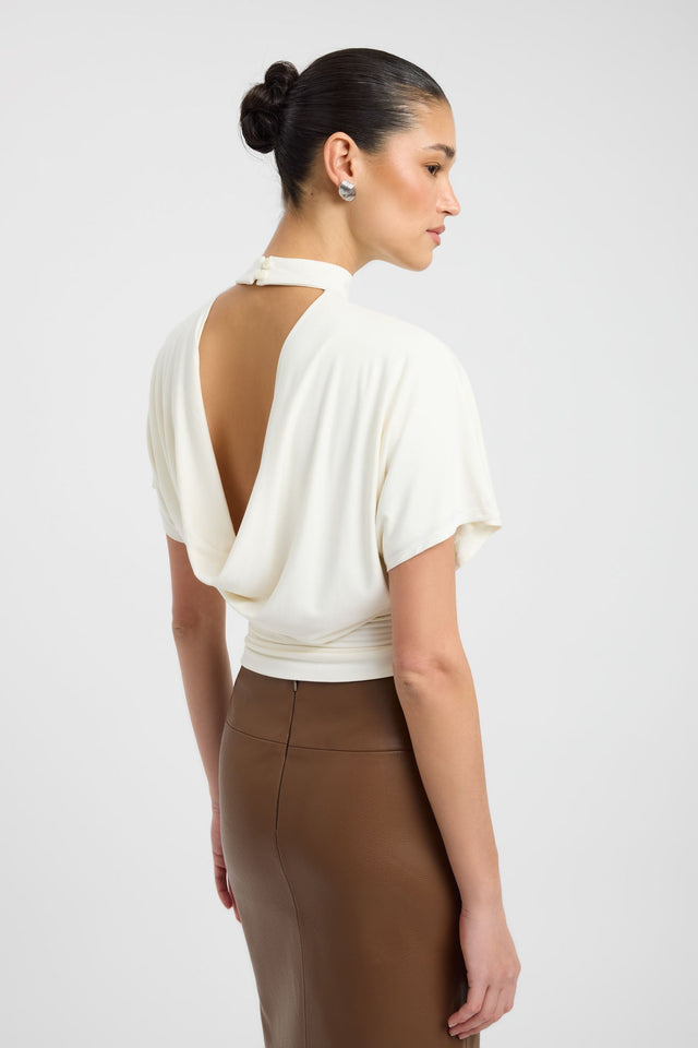 Featuring the Harley Top womens blouse in ivory with fitted high-neck and short sleeves side