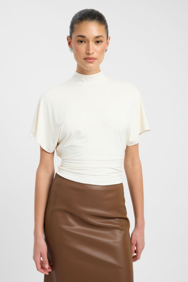 Presenting the Harley Top womens blouse in ivory with fitted high-neck and short sleeves detail