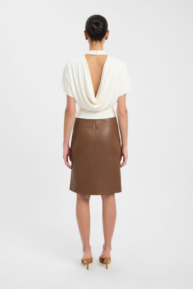 Designed with the Harley Top womens blouse in ivory with fitted high-neck and short sleeves back