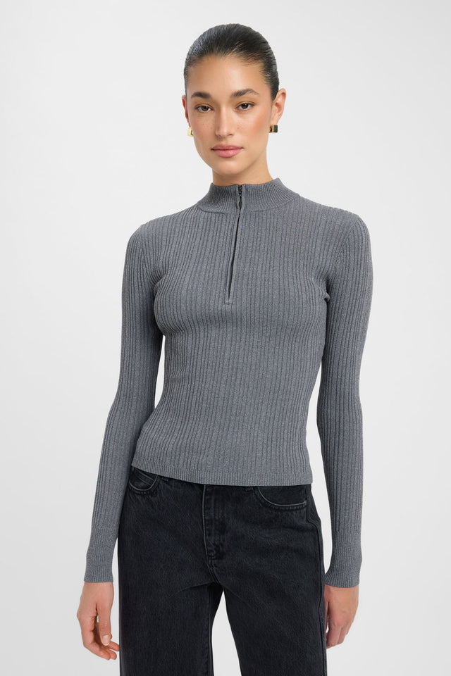Featuring the Bristol Zip Top womens blouse with dark grey ribbed knit, fitted cut, high-neck, and full straight sleeves front
