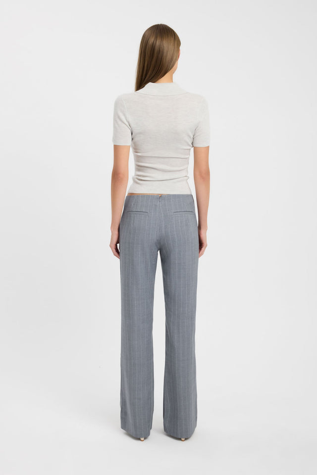 Crafted with the Jackson Polo Top womens blouse in beige with fitted silhouette, v-neck, and short sleeves back