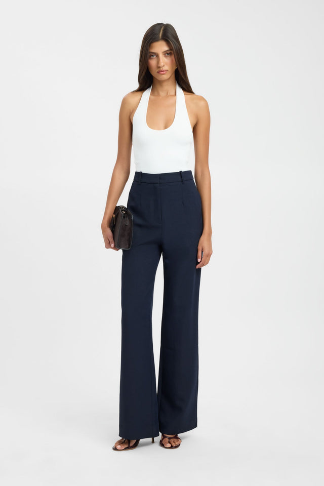 Showcasing the Ariel Straight Leg Pant in womens regular pants with wide-leg silhouette, high-rise waist, and navy colour on-body