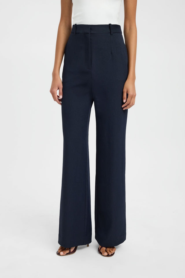 Featuring the Ariel Straight Leg Pant in womens regular pants with wide-leg cut, high-rise waist, and navy colour front