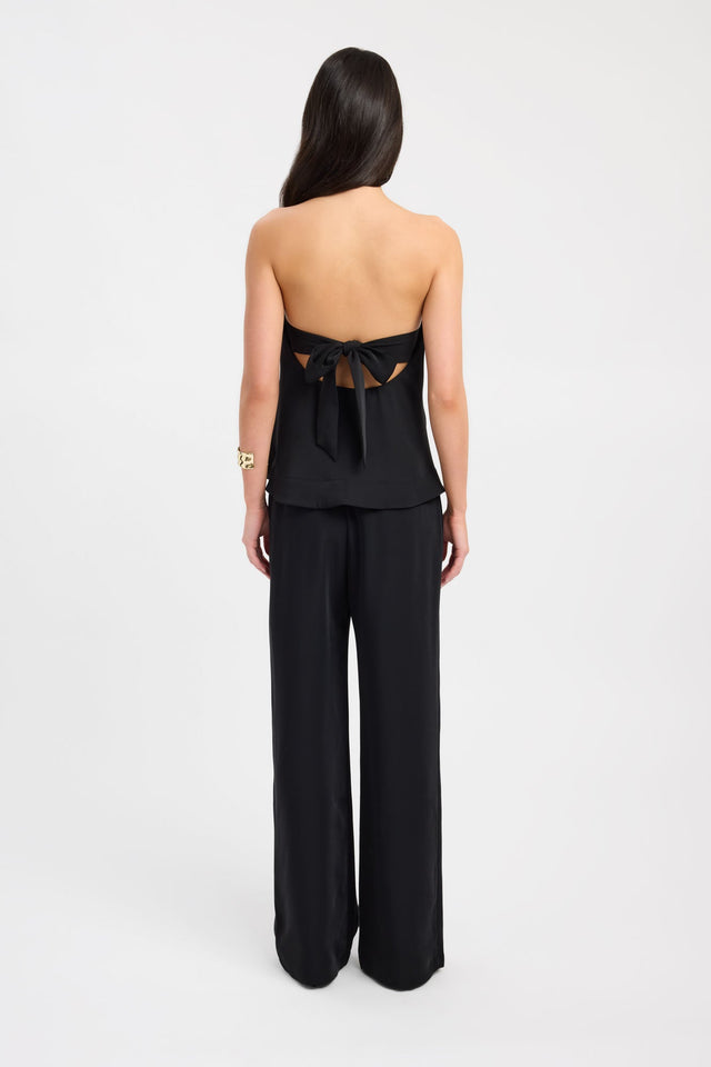 Crafted with the Maria Peplum Top womens-blouse featuring black fitted straight neckline sleeveless on-body