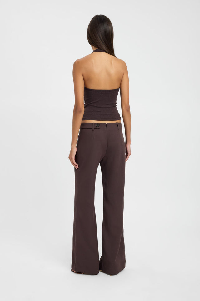 Crafted with the Rina Top womens-blouse in saddle brown with fitted silhouette, v-neck and sleeveless design back