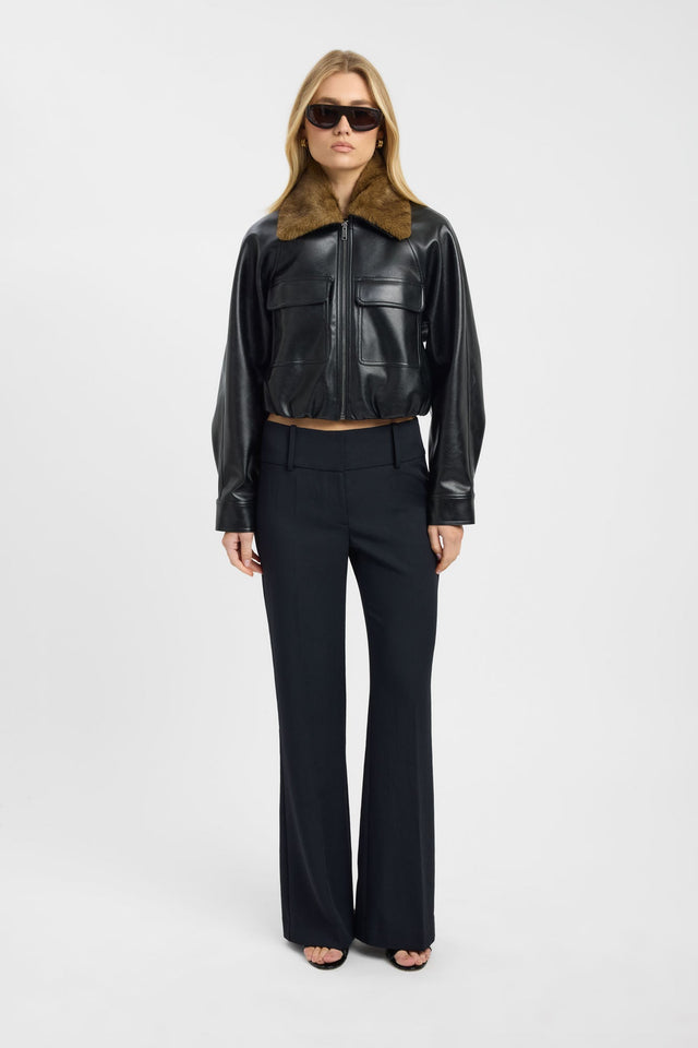 Showcasing the Heavy Phoenix Fur Jacket in women's coats and jackets with full sleeves, aviator style, short length, and black color on-body